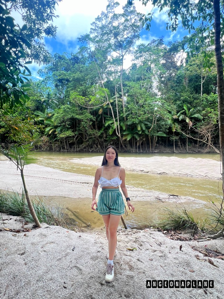 Posing in front of the river at Silky Oaks lodge